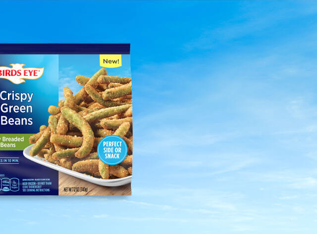 Birds Eye Crispy Green Beans package on a sky with clouds background